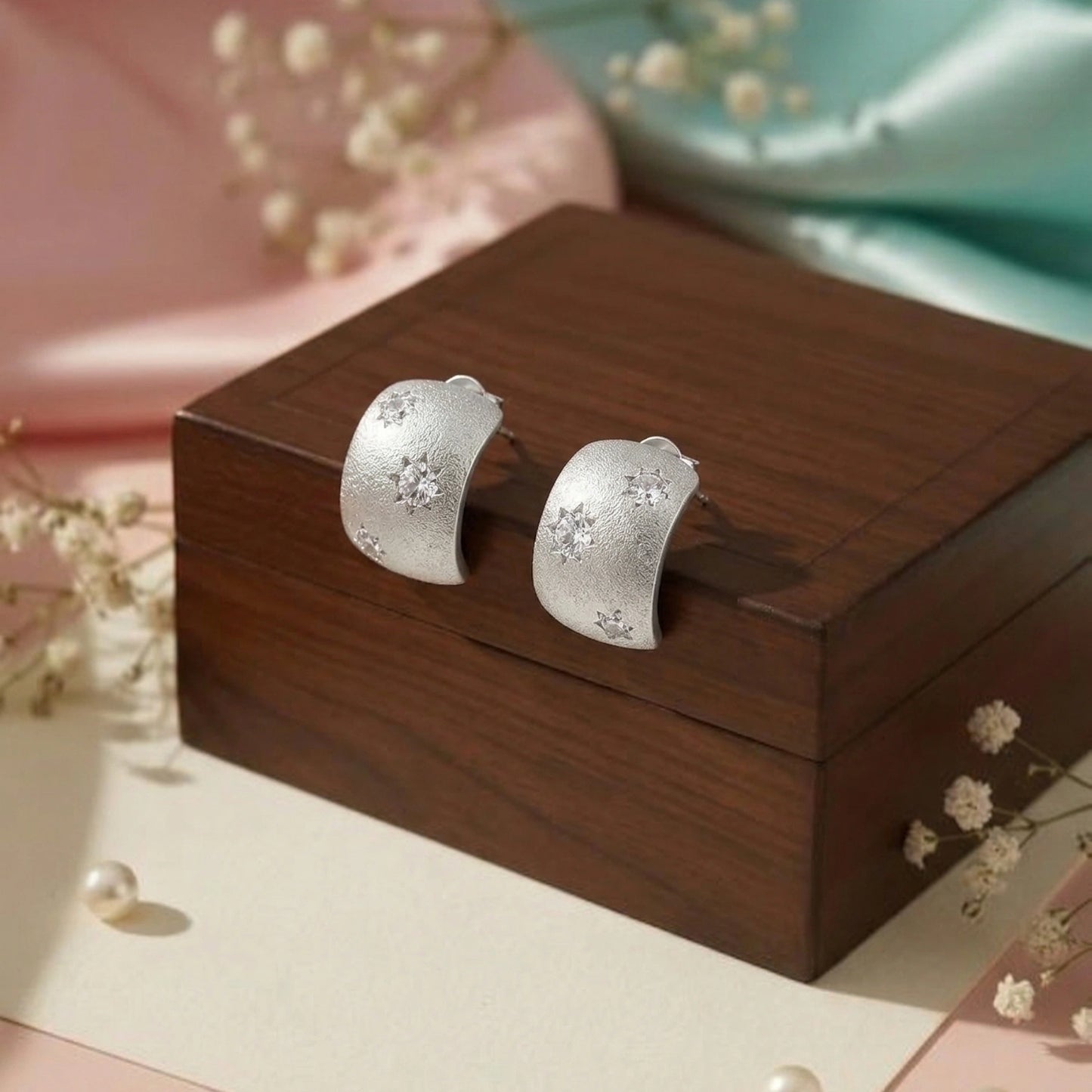 Silver Textured Floral Huggie Earrings image 0