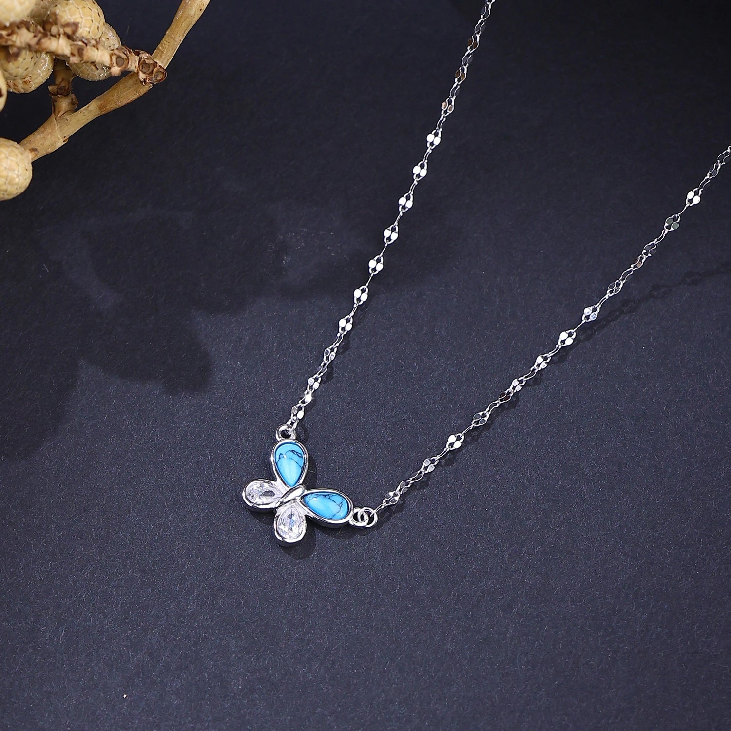 The Alencia Urban Turquoise Papillon Silver Necklace image 0