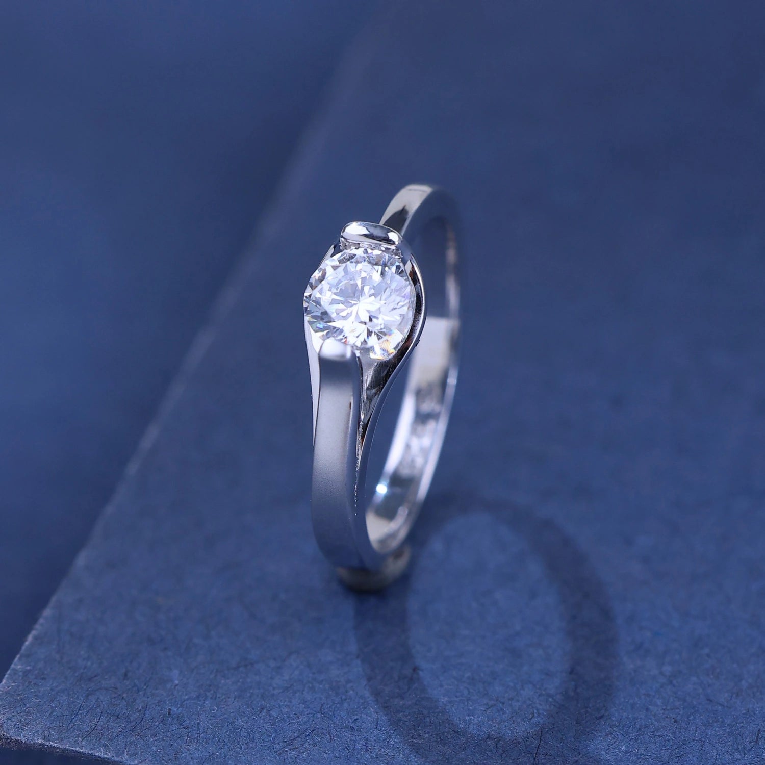 The Alencia Urban Serenade Ribbon Bypass Solitaire Ring image 0