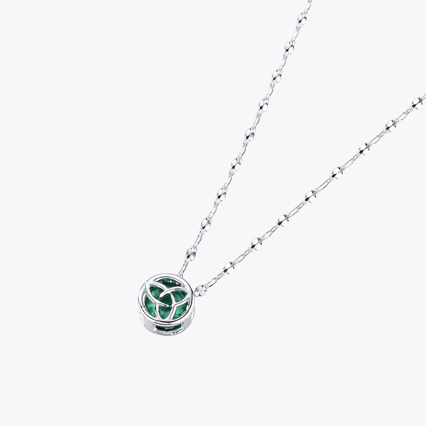 The Alencia Urban Emerald Triquetra Cage Necklace image 2