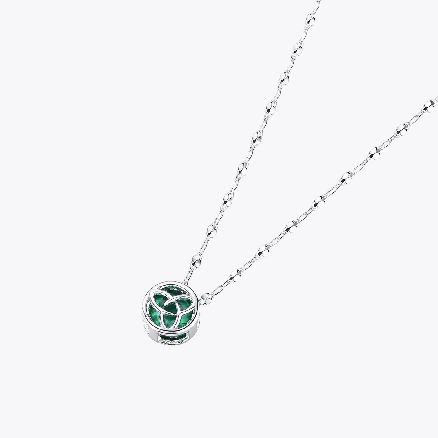 The Alencia Urban Emerald Triquetra Cage Necklace image 2