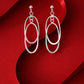 Silver Oval Orbit Drop Earrings image 0