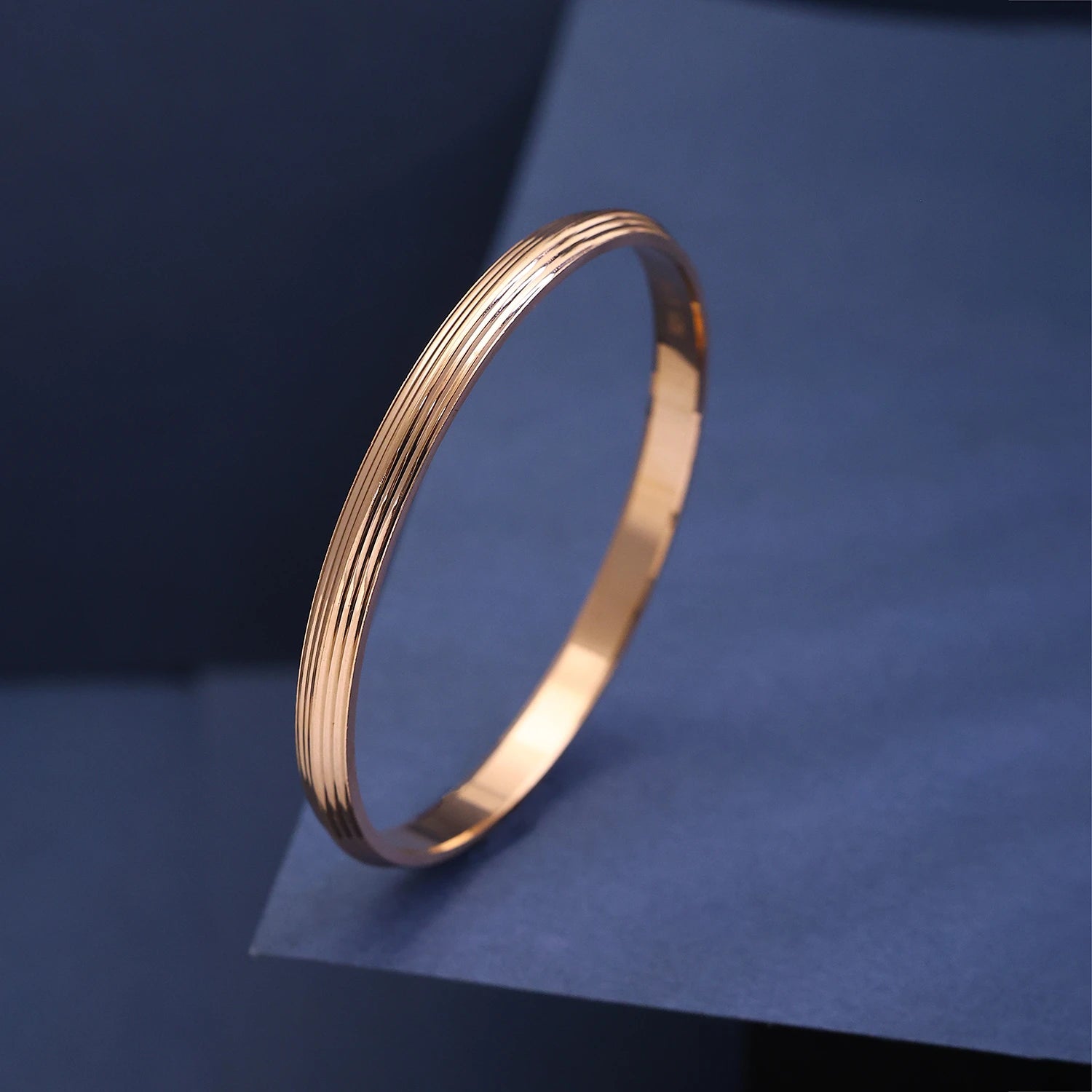The Alencia Urban Grooved Rose Gold Bangle image 0