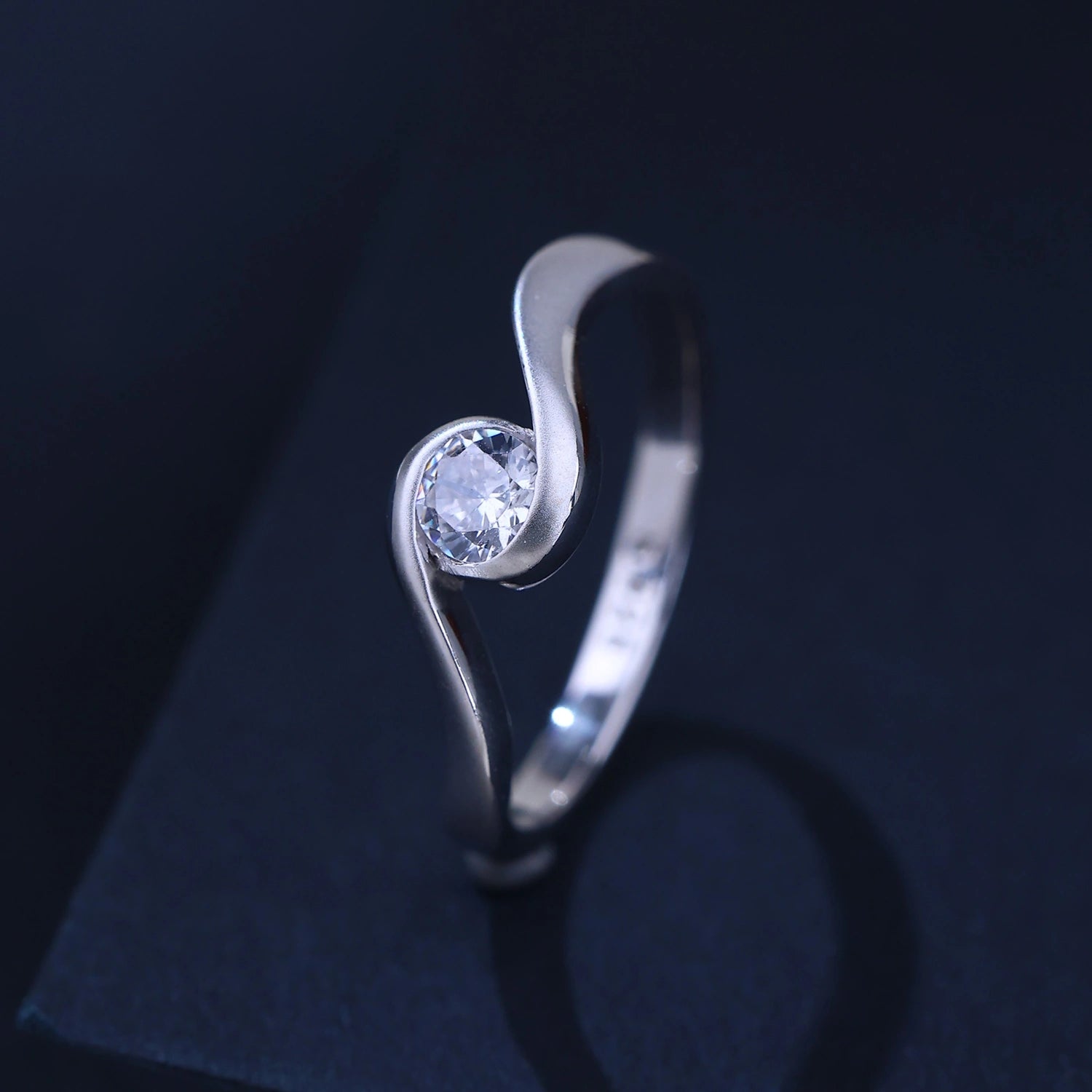 The Alencia Urban Serenade Wave Bypass Solitaire Ring image 0