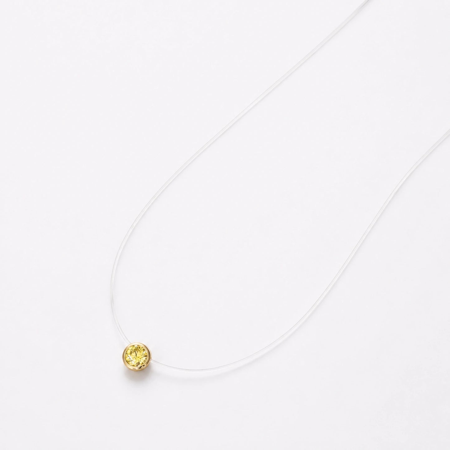 Golden Glow Solitaire Invisible Necklace image 2