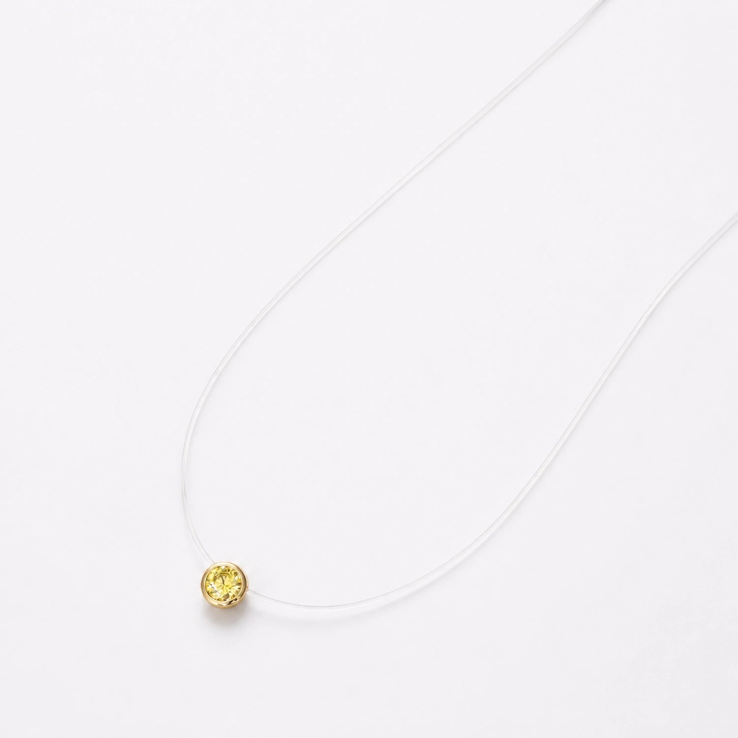 Golden Glow Solitaire Invisible Necklace image 2