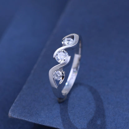 The Alencia Urban Serenade Three-Stone Wave Ring image 0
