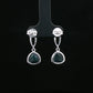 Emerald Aura Silver Drop Earrings