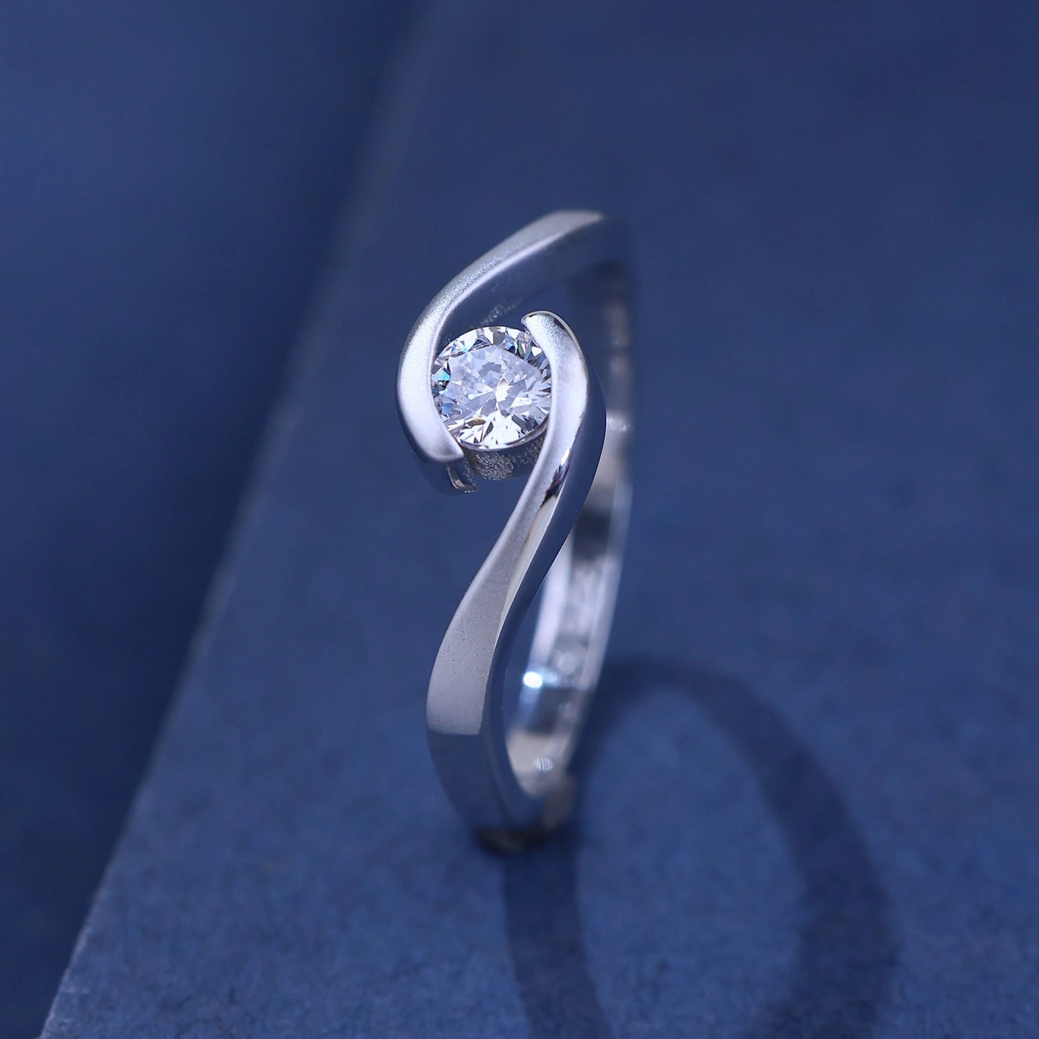 The Alencia Urban Serenade Swirl Bypass Solitaire Ring image 0