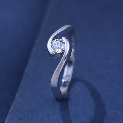 The Alencia Urban Serenade Swirl Bypass Solitaire Ring image 0