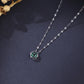 The Alencia Urban Emerald Triquetra Cage Necklace image 0