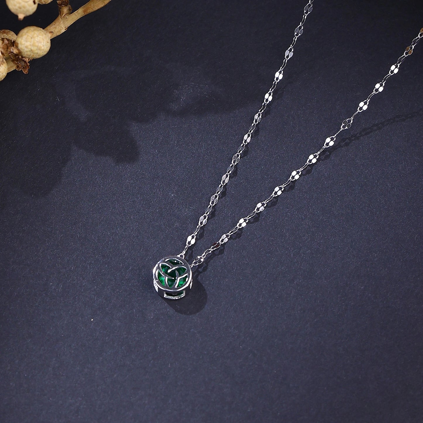 The Alencia Urban Emerald Triquetra Cage Necklace image 0