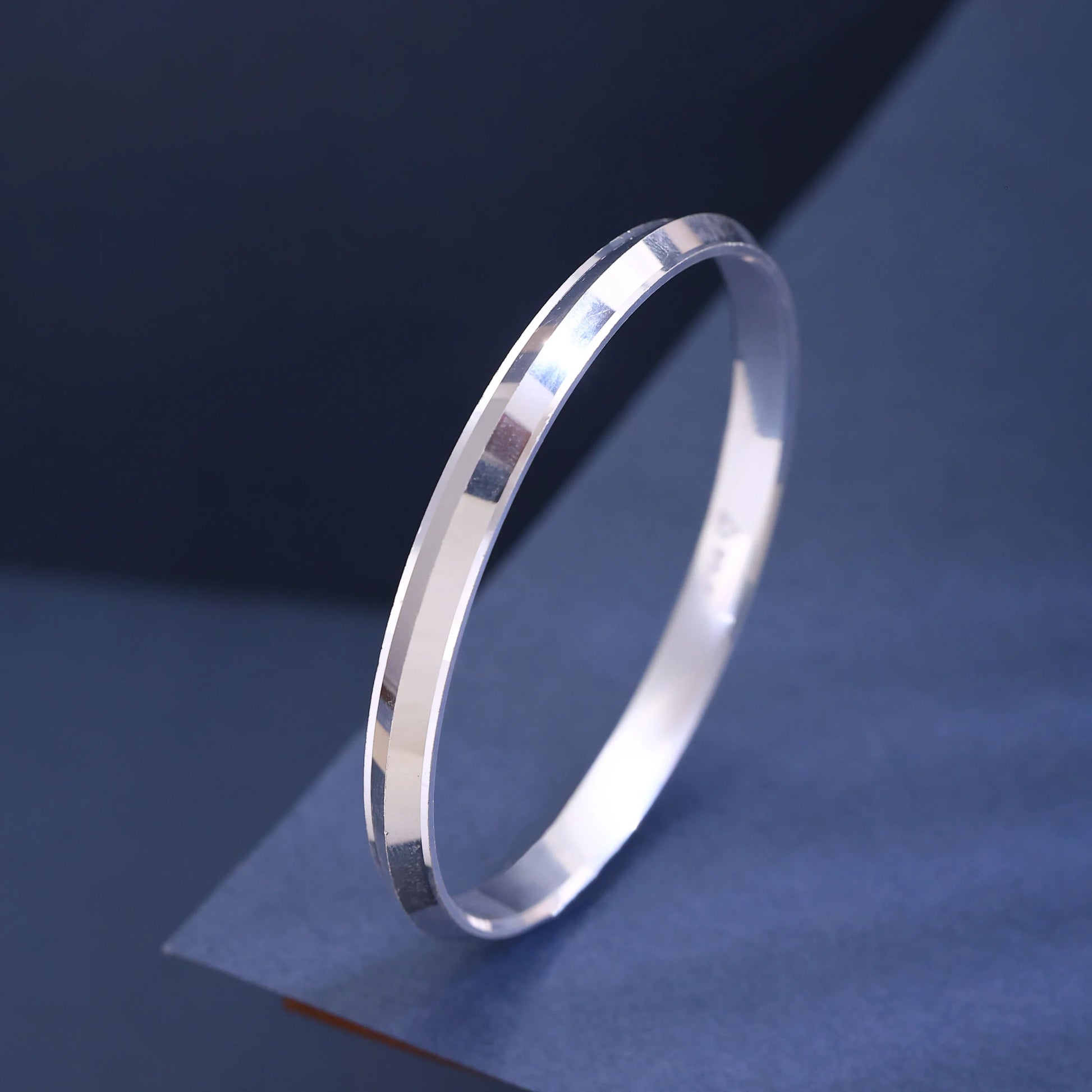 The Alencia Urban Beveled Edge Silver Bangle image 0