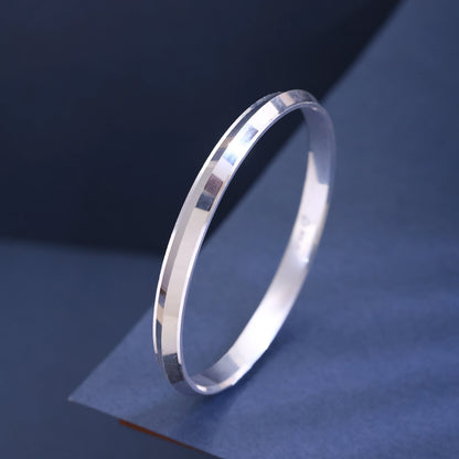 The Alencia Urban Beveled Edge Silver Bangle image 0