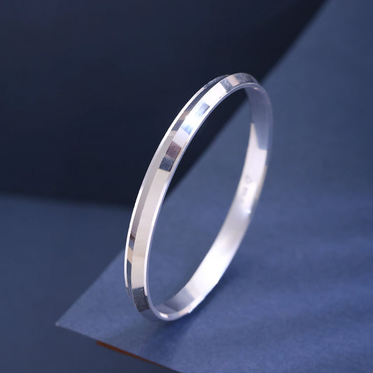 The Alencia Urban Beveled Edge Silver Bangle image 0