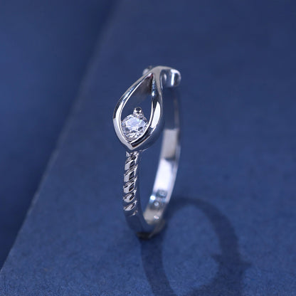 The Alencia Urban Serenade Teardrop Twist Solitaire Ring image 0