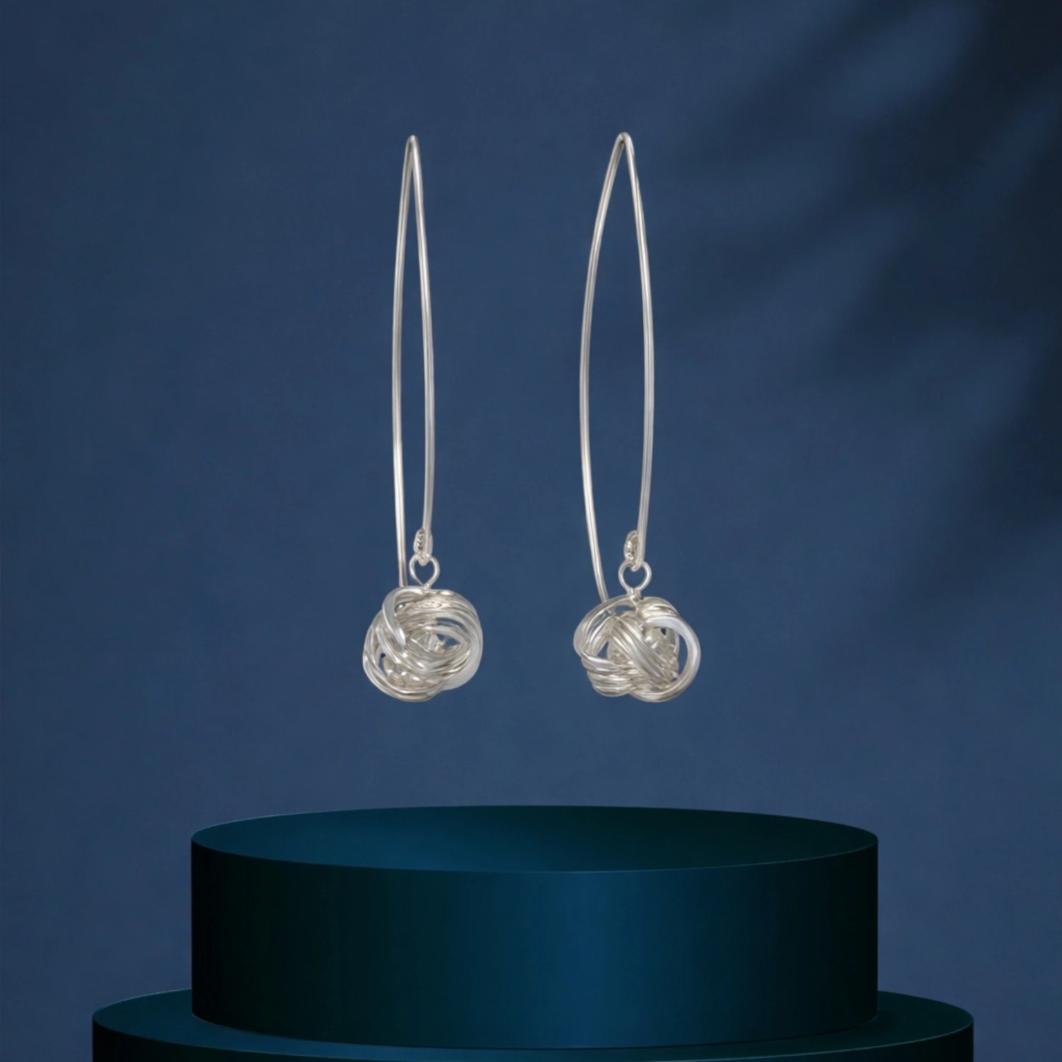 Silver Orbit Knot Drop Earrings image 0