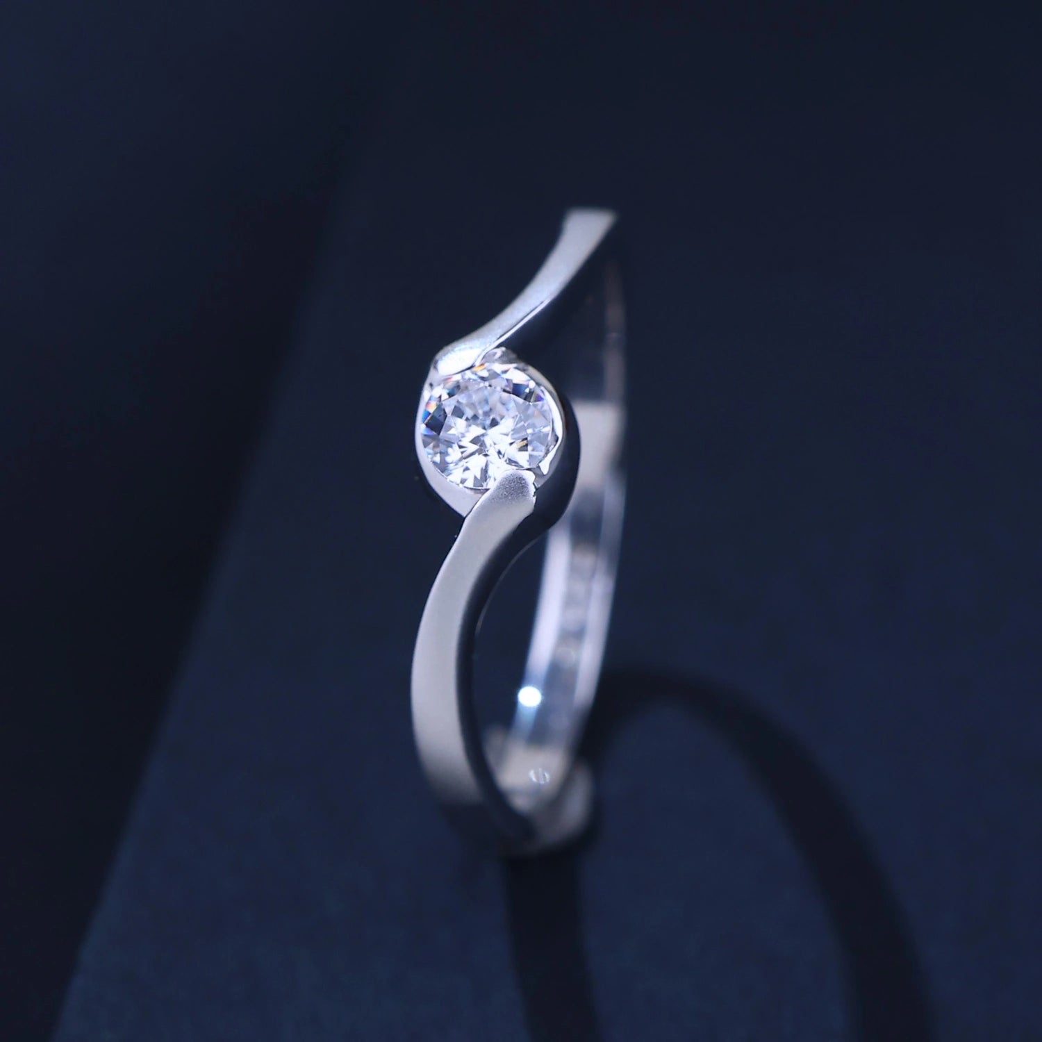 The Alencia Urban Serenade Bypass Solitaire Ring image 0