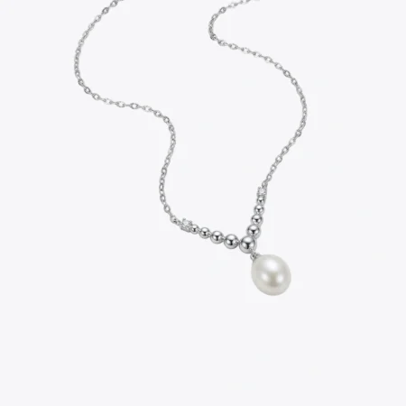 Feathered Pearl Crescent Necklace.
